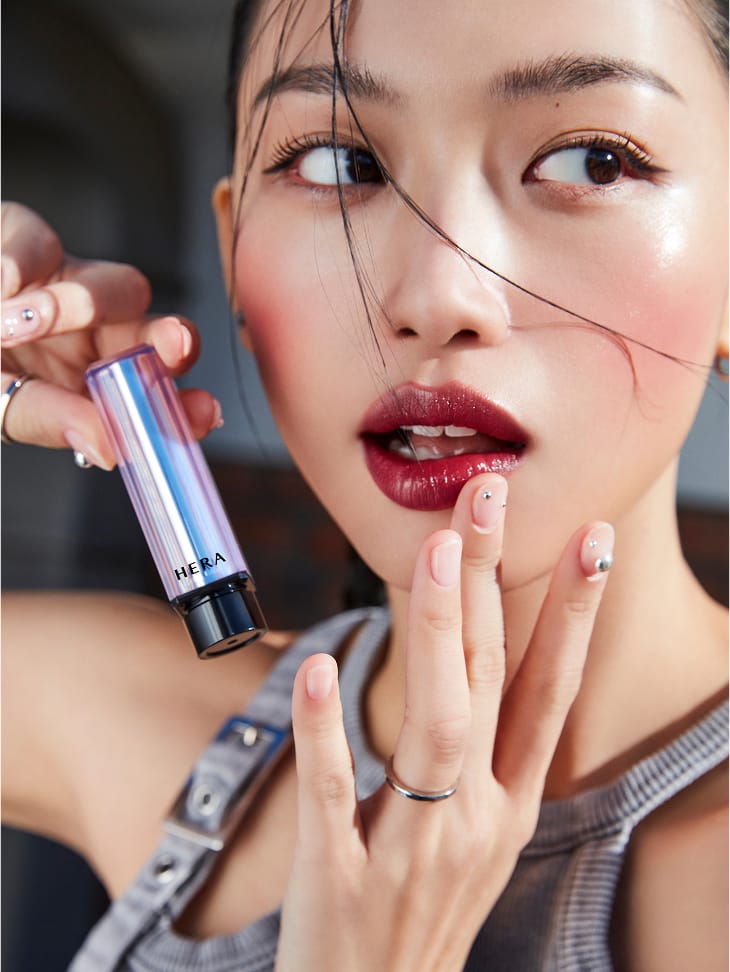 A model wearing Sensual Tinted Shine Stick